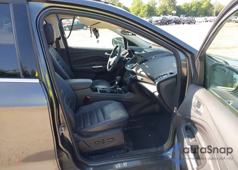 2017 Ford Escape Titanium z USA, uszkodzony, nr VIN 1FMCU9JD2HUA17583